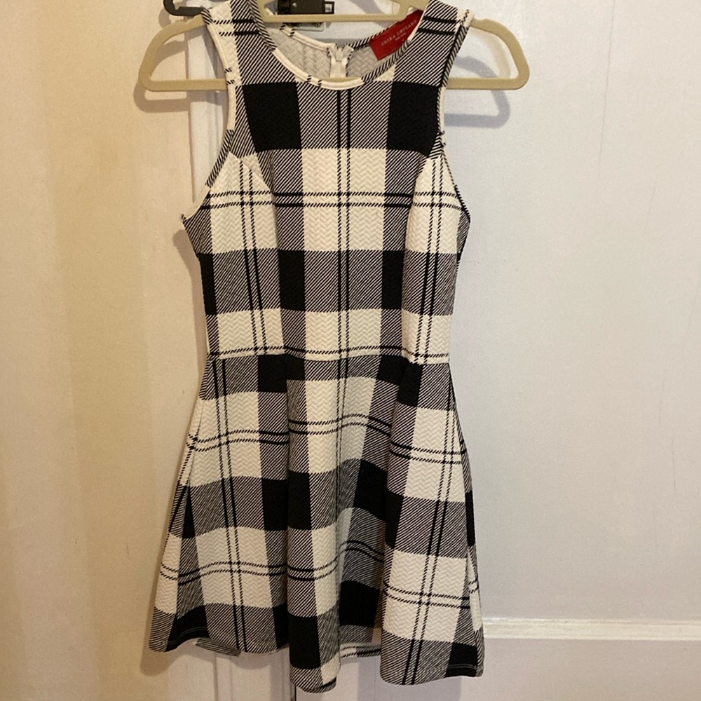 Akira Chicago, creamy white and black skater dress